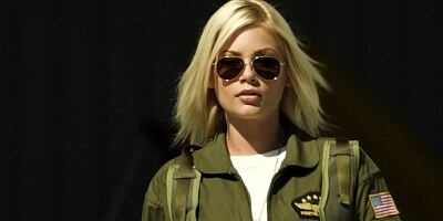 Hot blonde pilot is on her knees, doing a blow job to her collegue