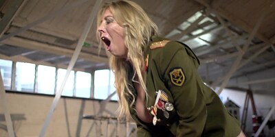 A sexy army girl is getting her busty body taken care off today