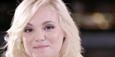 A pale blonde with a nice pair of tits is sucking and licking