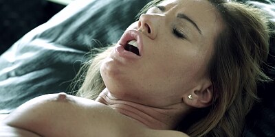 A blonde with natural tits is feeling some balls slamming against her