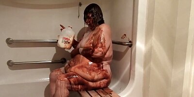 Ugly, obese old lady, huge belly, nude shower with chocolate syrup