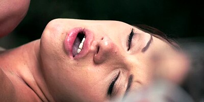 A busty bimbo that has perfect tits is sitting on the grass, fucking