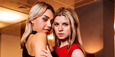 Gina Gerson and Elena Vedem are getting anally screwed on the sofa