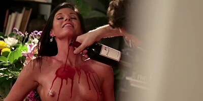 A hot bitch is on the wooden desk, getting penetrated deeply