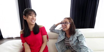 Adorable girls are having an interracial threesome in front of the camera, just for fun