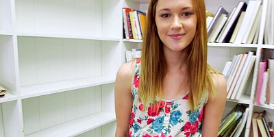 A sexy redhead with a fine ass is getting fucked in her shaved cunt