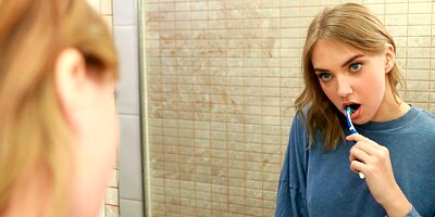 An innocent teen Oxana Chic gets penetrated from behind