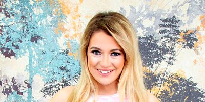 Big-bottomed blonde Abby Adams opens her crack in the missionary pose