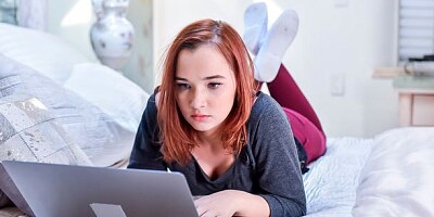 Redhead hottie April Reid gets fucked in the doggy style pose