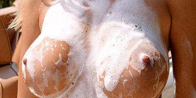 Great-looking car wash solo with a busty blondie Peneloppe Ferre