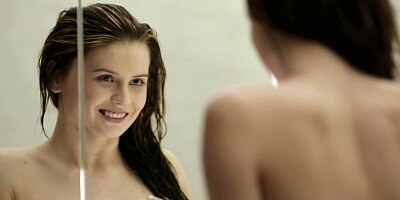 Smiling babe masturbates in the bathroom in HD solo video