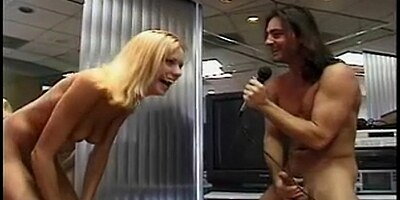 Hot blonde sucks a hard cock on the rooftop of a building