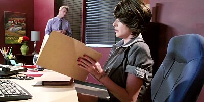 A brunette that has huge boobs is getting her pussy slammed in her office