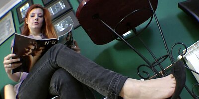 Goddess Victoria dangles ballerina flats and rubs feet into a slave's face