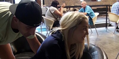 Hot blonde is getting her pussy fucked while she is in a cafe
