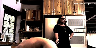 Dominatrix Mistress April - caning her slave's ass