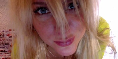 Nice breasted blonde showing her ass