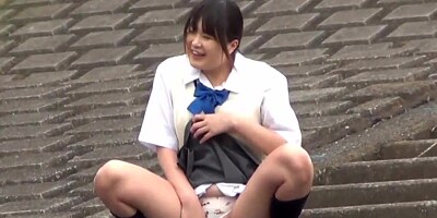 Oriental teenagers urinating in street
