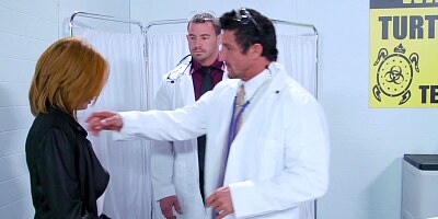 A blonde that loves to get massages is on the table, being covered with oil