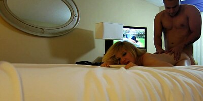 Adorable teen with blue eyes and golden hair is giving a blow job