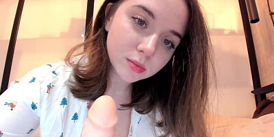 A slender girl shows her naked body and caresses a pussy