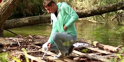 Cute couple in love is enjoying sensual intercourse out in the woods