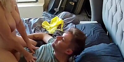 Busty mom rides stepson's cock and then gets fucked doggystyle