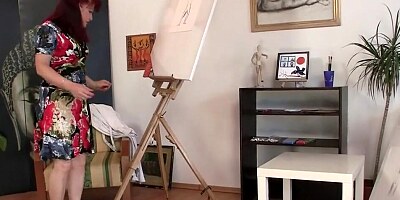 Mature painter fucks with a handsome model in the studio