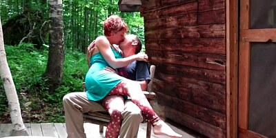 Redhead MILF is riding hard cock at the house porch