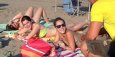Spanish chicks seduced on a beach