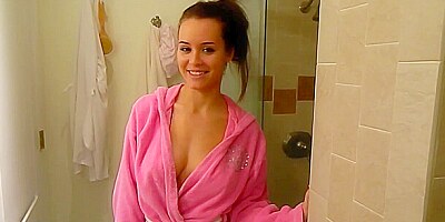 Teen with very cute pair of boobies showering