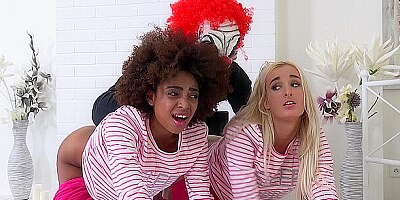 Evil clown attacks two girlfriends