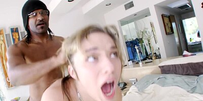 Couple is having interracial sex on the bed in front of the camera