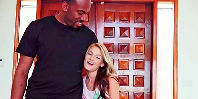 Tiny blonde is with a large black dude