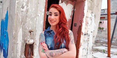 Redhead is having some sex while outside in a ruin