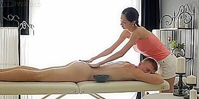 Busty massage girl fucks her client with Sergei and Emma