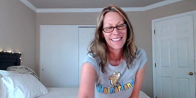 Momma with glasses drills her pussy with rubber dildo