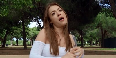 Babe with amazing tits is giving outdoor blowjob