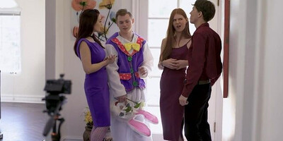 Two chicks and two dudes are having a foursome on the couch