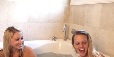 Teen blonde lesbian bathing with bff