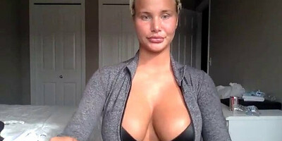 Athletic blonde showing her body and pussy to the camera