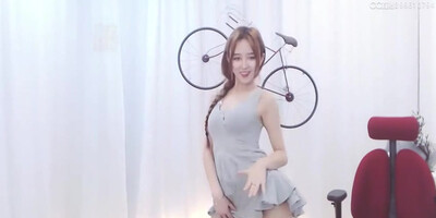 Enrapturing dark haired in a supah brief sundress is dancing in front of the web camera