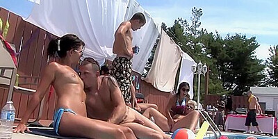 A Group Of College Co-eds Have An Orgy By The Pool
