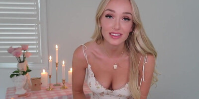 Jiggly towheaded is providing a oral job to a mate, while he is attempting to hold the camera