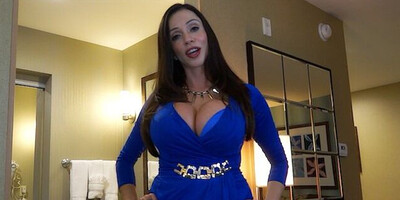 Busty MILF Ariella Ferrera flirts with the camera while polishing knob