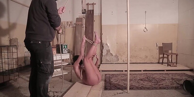 Slender gal got nude, strapped up and tormented for a while in a random dungeon