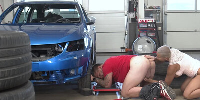 Short-haired blonde licks dude's ass and fucks in the garage