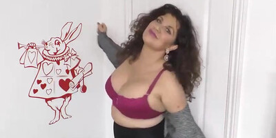 Chubby mature black-haired, Gilly is being a highly horny woman, in front of the camera