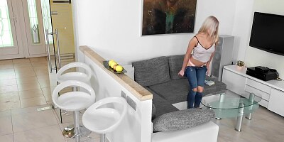 Beautiful blonde woman rubbing her tight pussy at home