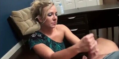 Amateur MILF grabs that hard cock and strokes it like a pro